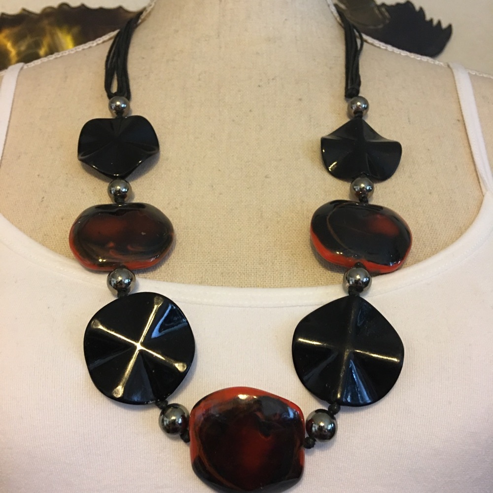 Marbled glass and plastic disc corded necklace